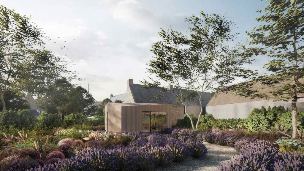 une extension de maison en bois avec jardin et arbres en Bretagne